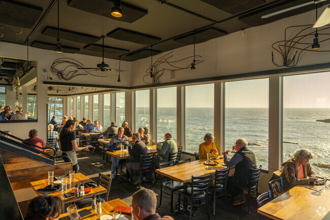 Enjoy beautiful coastal sunsets from Tidal Raves in Depoe Bay.