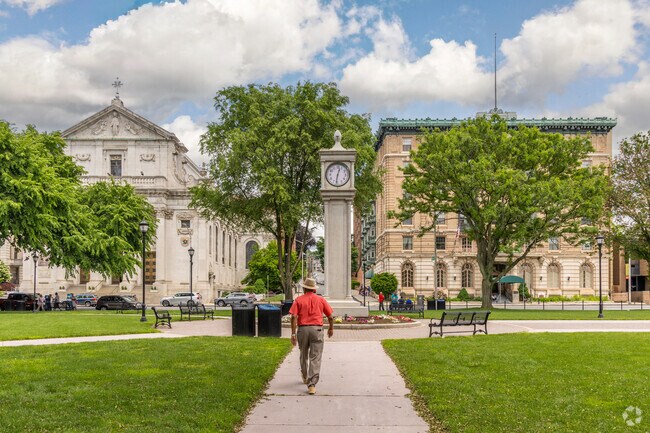 Waterbury Green near Wolcott provides walking paths, green space, and a historic clocktower.