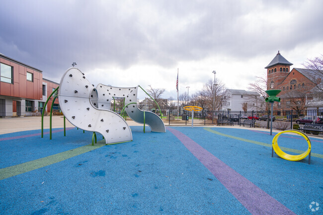 Kids can climb on this structure outside of East Somerville Community School.