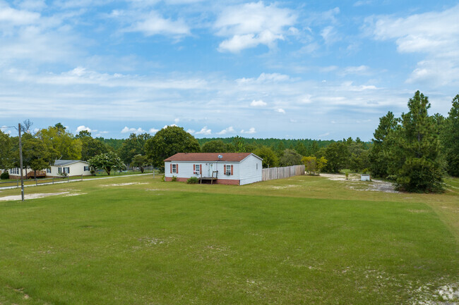 Homes in Bath-Edie offer open lots with well simple landscaping.