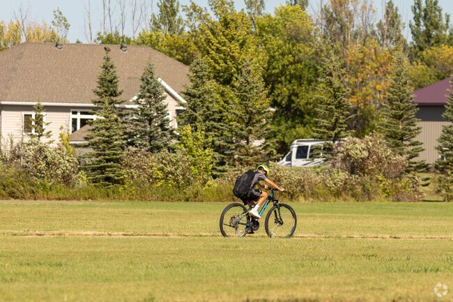 Knutson places emphasis on outdoor living with well-planned green spaces, and paths.