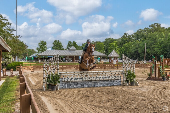 Riders and their horse must be in unison to complete difficult jumps at the GCHS in Germantown.