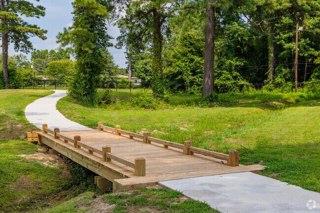 Enjoy a nice walk on the trails at TS Martin Park near Jones McDonald.