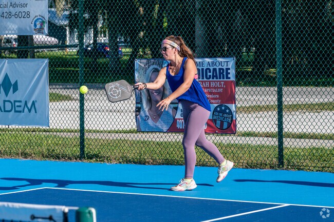 Historic Westside locals enjoy a riveting game of pickleball at Pettis Park.