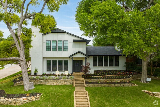 Along the tree lined streets in Richardson modern farmhouse style homes are popping up.