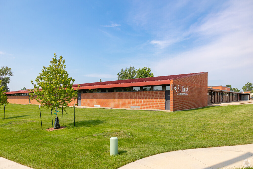 St. Pius X. Elementary School is located on Council St NE.