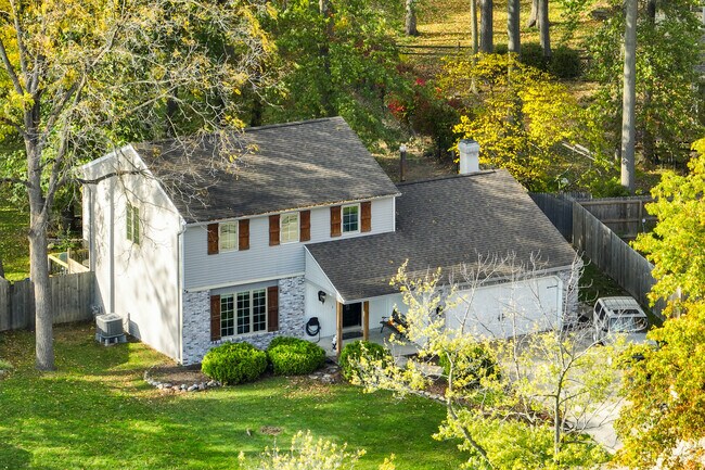 Colonial homes with fences and gardens are common in Concord Hills.