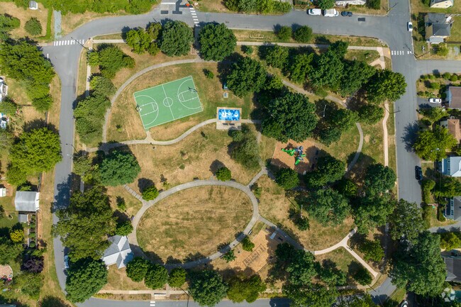 Belmont Park provides open greenery spaces, a basketball court and playground to enjoy.