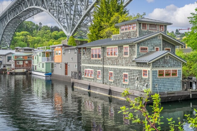 A row of House Boats under the Aurora Bridge in the Seattle neighborhood of Westlake.