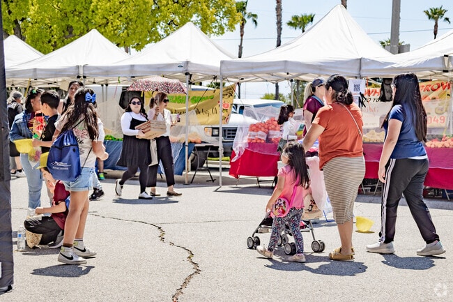 Rialto residents enjoy a sunny Wednesday at the Farmers Market.