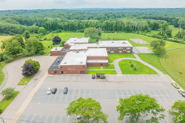 John M. Moriarty Elementary School sits on several acres of fields and forest.