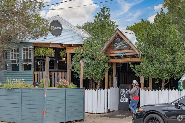 Weekend live music events happen near the highway in Lafayette’s West End.