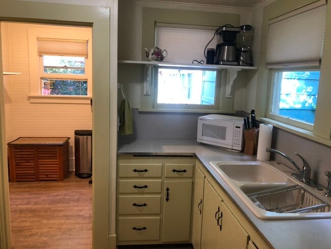 Back door to garage space & patio