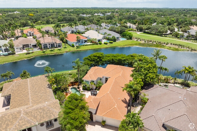 Spacious luxury homes stand in the private community of Addison Reserve.