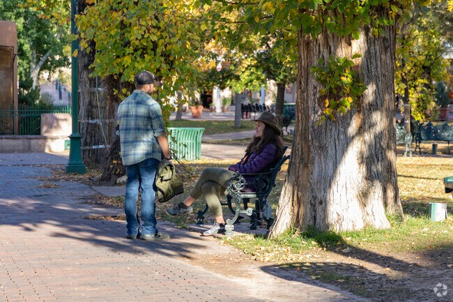 Shaded benches make hanging out in the plaza near La Nueva Casa Solana cool and comfortable.