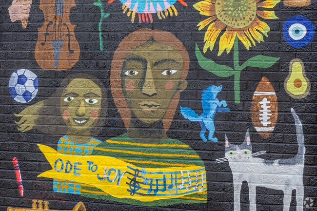 Ode to Joy mural is a brightly colored mural painted on a wall in East Price Hill.