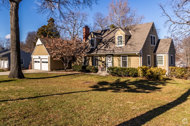 Leawood Prairie Village has a variety of homes with large front yards with two car garages.