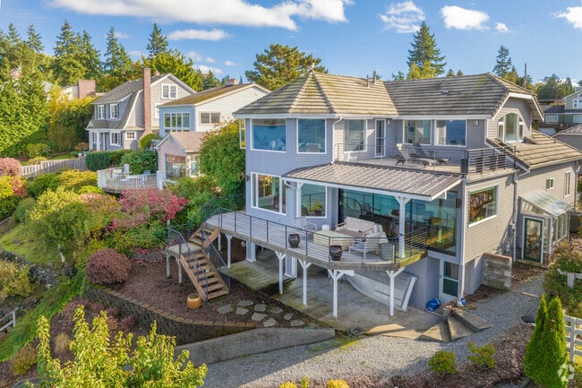 Large and stately homes sit on terraced lots overlooking the Puget Sound in Browns Point.