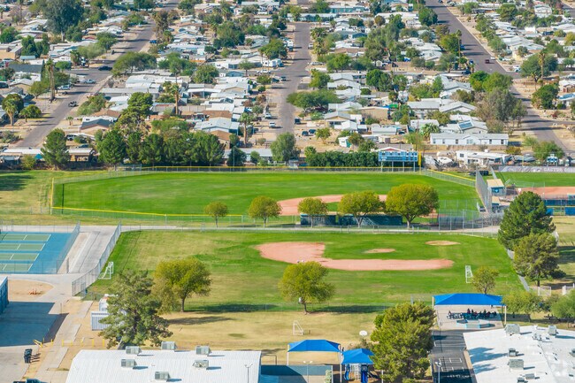 Exploring the baseball field at Cactus High School in Glendale.