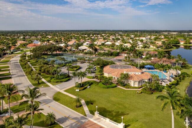 Aerial view shows Boca Isles homes and green spaces in Mission Bay.