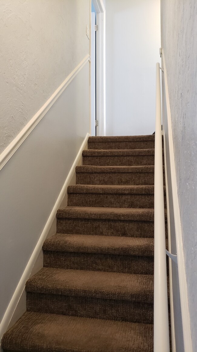 To upstairs bedrooms