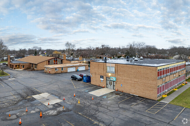 St. Linus School rear entrance and St. Linus Activity Center.