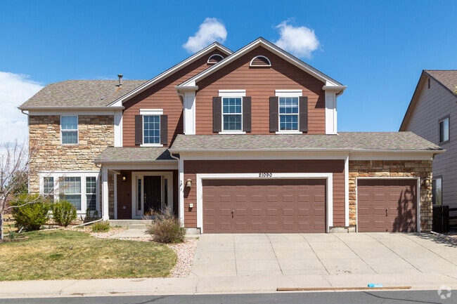The curb appeal of this Hidden River home is off the charts.