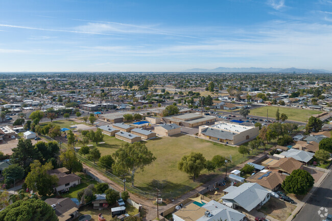 Mesa's Longfellow Elementary includes a large grass field for soccer and other activities.