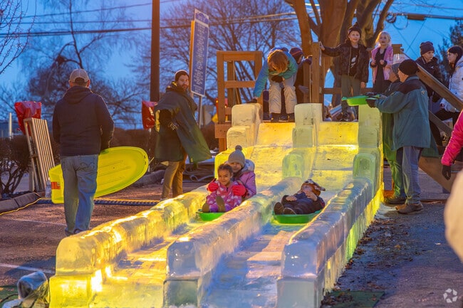 The doublewide ice slide is hugely popular with the Guilford's kids at the IceFest in Chambersburg.