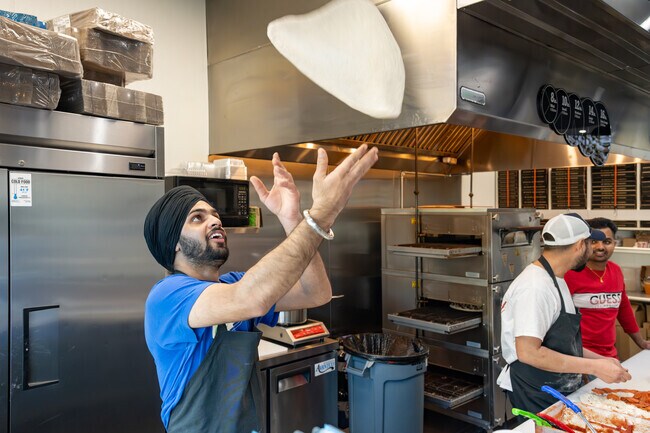 Catch the chef at the Pizza Factory catching his dough in Frick.