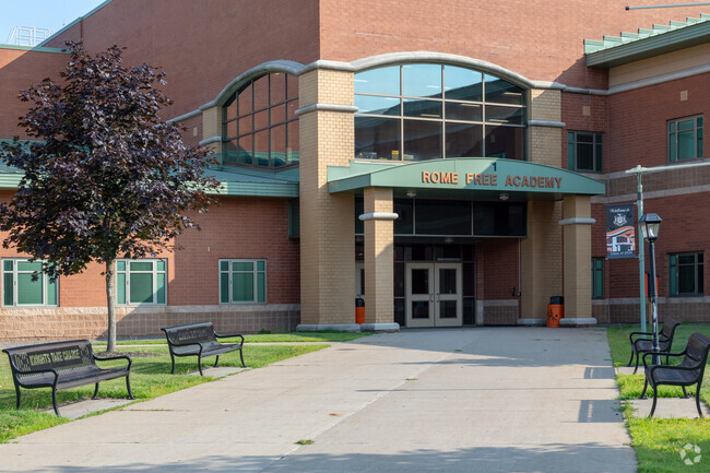 The Rome Free Academy is housed in a modern building with secure entrances.