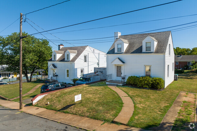 Older cape cod homes are sprinkled throughout Woolen Mills.