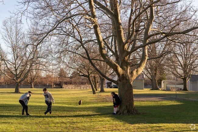Sloan Village Park has plenty of green space for ball games as well as a playground.