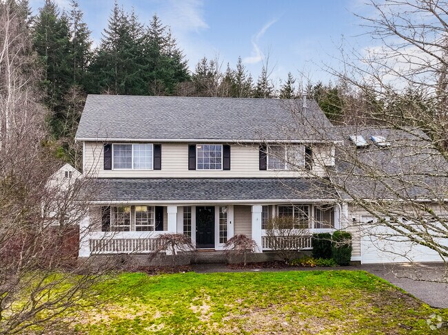 Beautiful two storey home with large porch in the Prairie Ridge neighborhood.