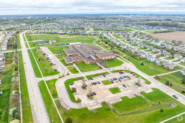 The campus of Maple Grove Elementary is adjacent to a large park of the same name.