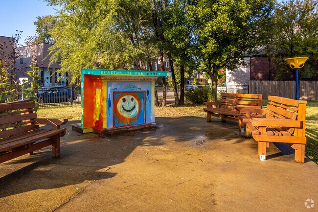 Botanical Heights neighborhood playground features a wood puppet theater.
