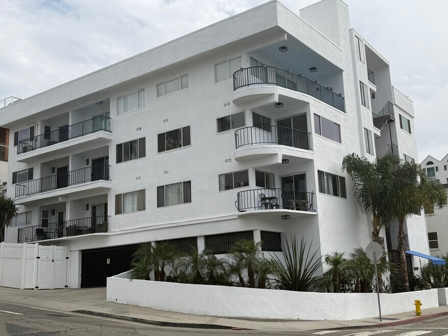External view of building with parking garage entry on Seaside Terrance side