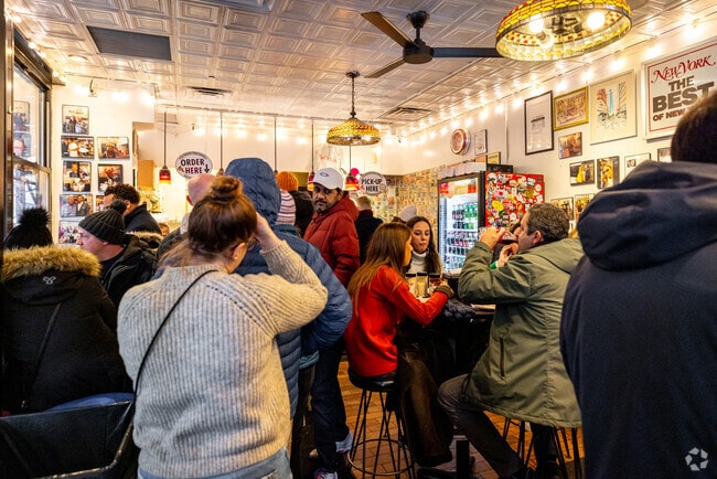 Grab a slice of New York from Joe's Pizza on Fulton Street in Civic Center.