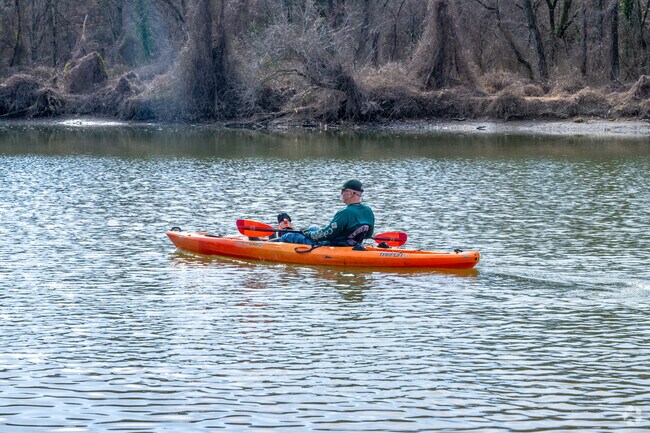 A kayaker paddles down the Anacostia River. The river's northeast branch runs through Edmonston.