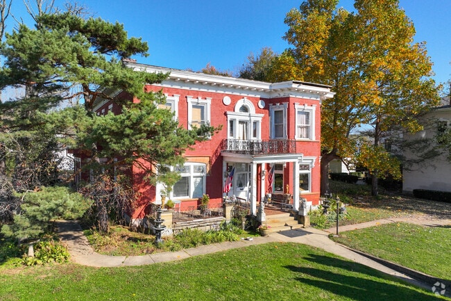 Historic colorful houses are facing the Ohio River in New Richmond neighborhood.