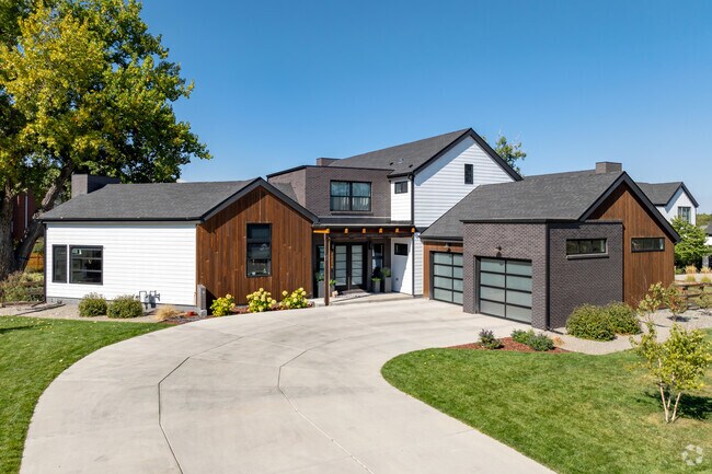 Subdivisions like Applewood Place include larger New Traditional homes built in the early 2000s.