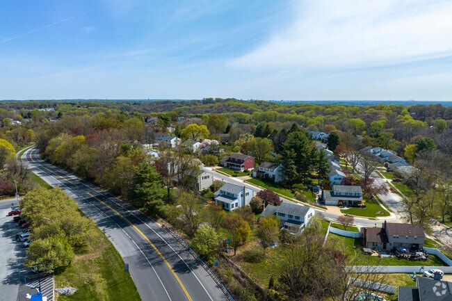 The Pike Creek neighborhood in Newark, Delaware is surrounded by lush greenery.