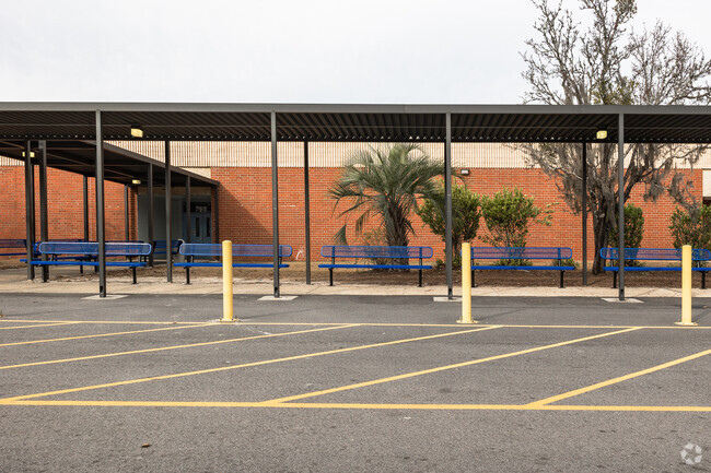 Colleton County Middle has covered pick up areas with bench seating in Walterboro.