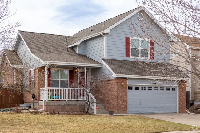 Brick accents highlight this craftsman-style home in Sterling Hills.