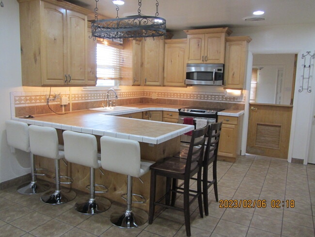 8838 W 3500 S unit Upstairs, Magna, UT 84044 - photo 2