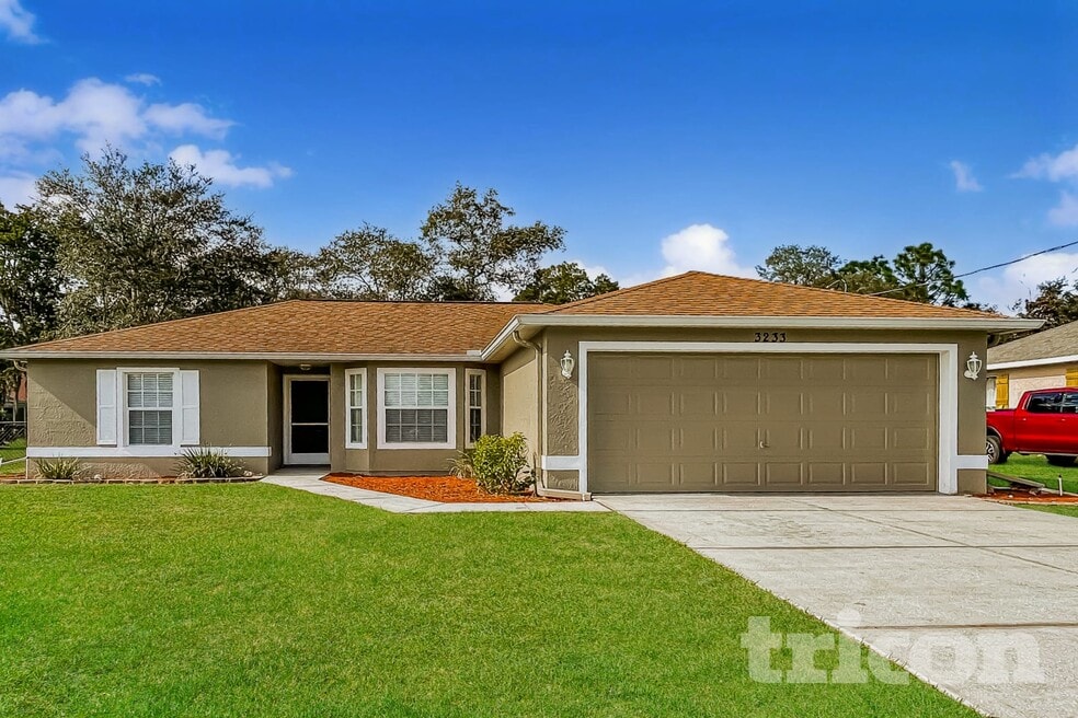 3233 Ambassador Ave, Spring Hill, FL 34609 - photo 1