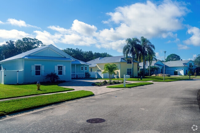 You can find new metal roof homes on wide streets in the Sugar Mill neighborhood.