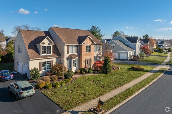 Large colonial revivals are comfortable and spacious for growing families in Spring Ridge.