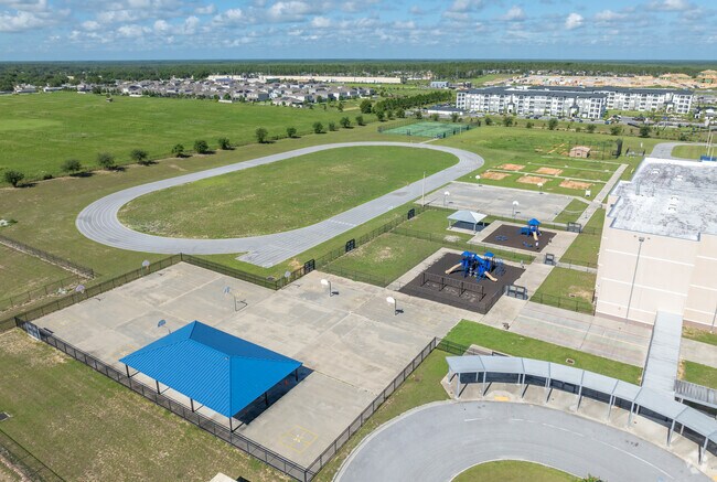 Bella Citta Elementary has a full 1/4 mile track and large PE area.