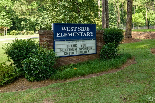 The entrance sign at West Side Elementary School keeps students and parents informed.